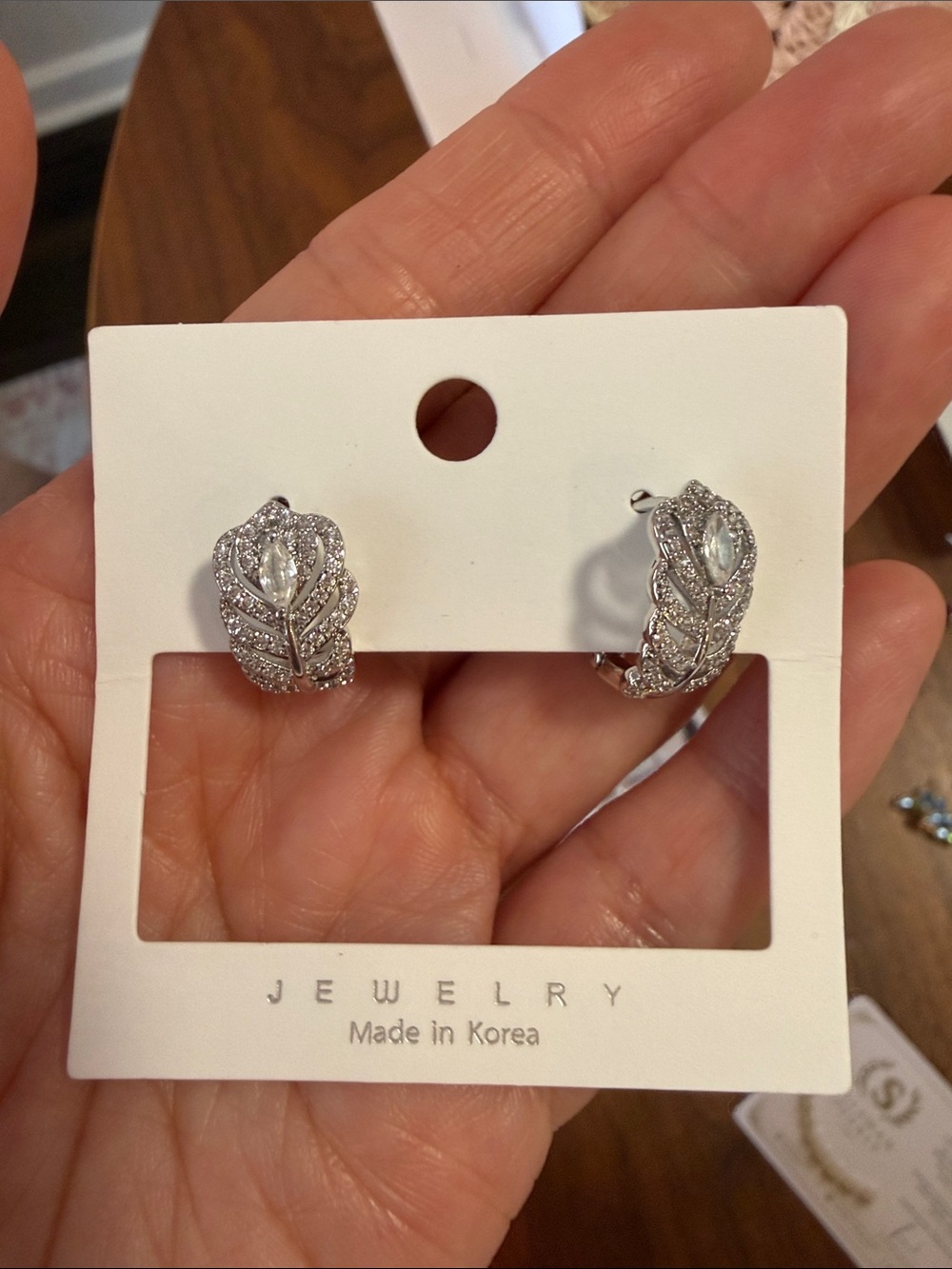 Crystal Leaf Huggie Earrings 
New/ hoop huggie style
Made in Korea